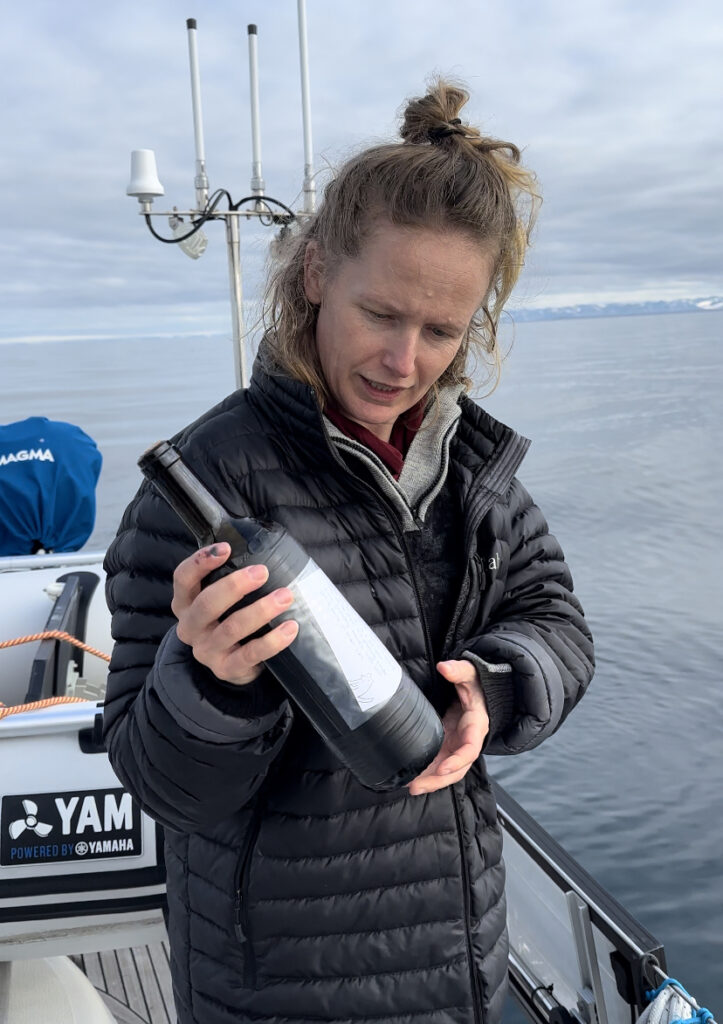 Sarah throwing a bottled letter at 80 degrees north