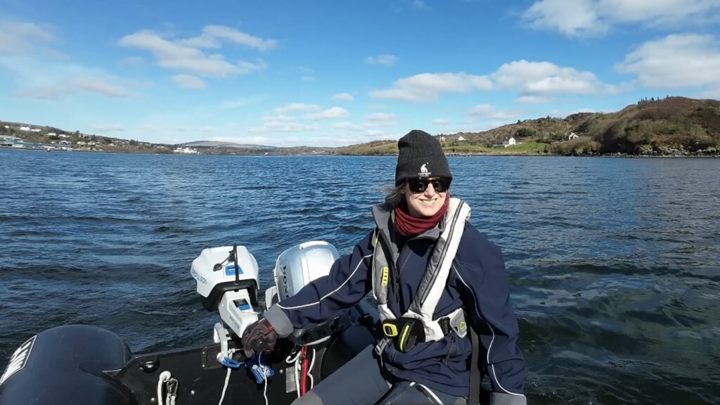 Sarah testing electric outboard