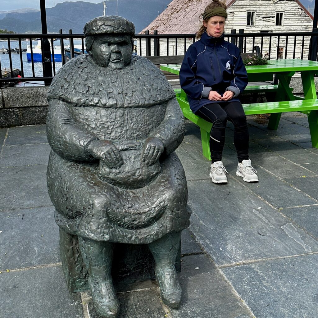 Sarah with a statue of a lady