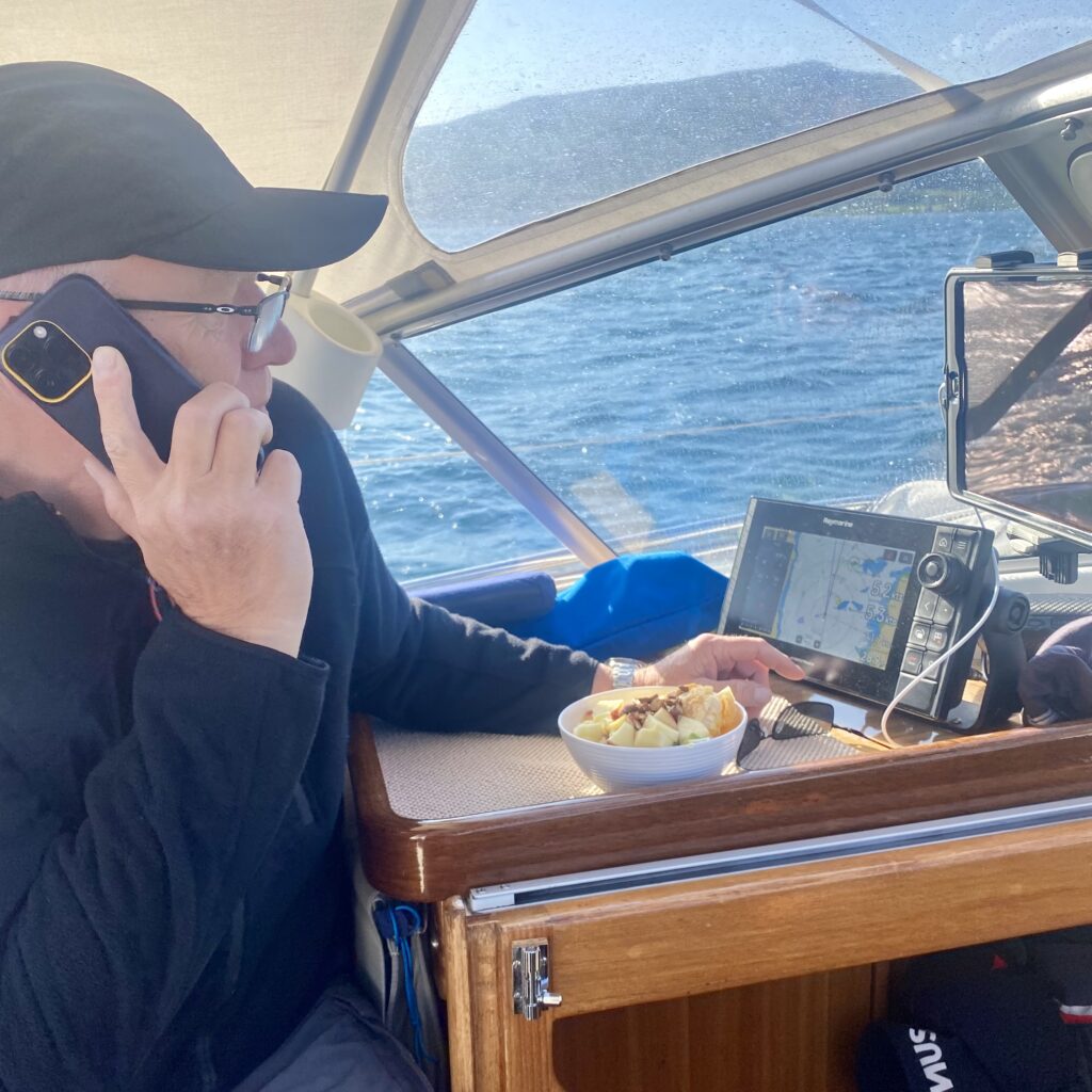 Steve sailing and eating salad