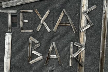 Picture of the texas bar sign at the cabin