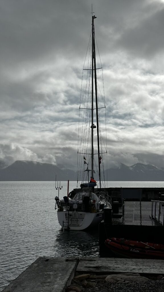 Yacht Snowbear in the little harbour in Pyramiden