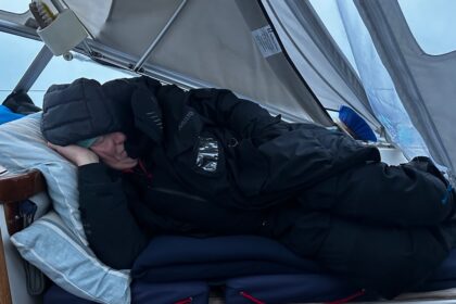 Steve sleeping in the cockpit